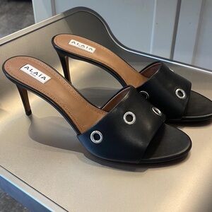 Alaia Black Heeled Mules with Silver Accents